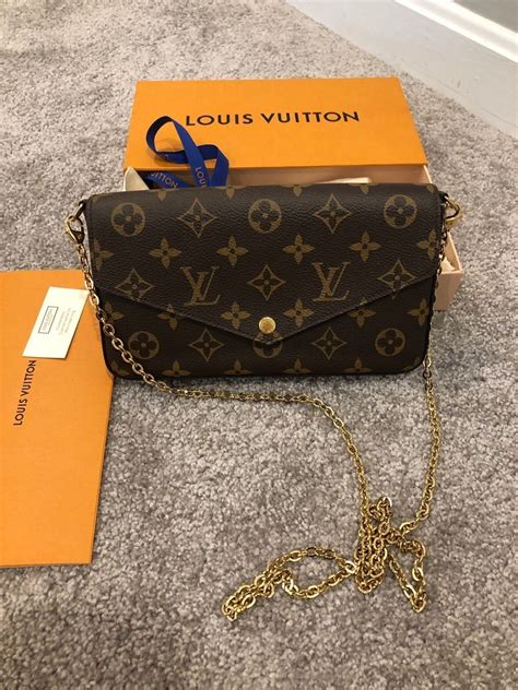 lv black bag gold chain|louis vuitton black chain bag.